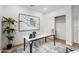 Bright and airy office with large desk, modern decor, and ample workspace at 5537 E Earll Dr, Phoenix, AZ 85018