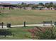 Community park with playground, walking path, and benches at 5635 W Huntington Dr, Laveen, AZ 85339