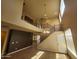 A grand foyer showcases high ceilings, a staircase, and plenty of natural light at 5635 W Huntington Dr, Laveen, AZ 85339