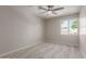 Bedroom with neutral walls, plush carpet, and window with natural light at 6004 N 79Th St, Scottsdale, AZ 85250