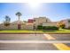 Charming townhome with a red roof, desert landscaping, and a palm tree in the front yard at 6004 N 79Th St, Scottsdale, AZ 85250