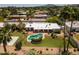Stunning aerial view of the property showcasing the pool, backyard, and surrounding neighborhood at 6102 E Friess Dr, Scottsdale, AZ 85254