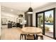 Kitchen with a dining area that overlooks a private pool at 6102 E Friess Dr, Scottsdale, AZ 85254