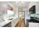 Modern kitchen featuring white cabinets, stainless steel appliances, and light countertops at 6349 N 78Th St # 105, Scottsdale, AZ 85250