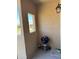 Outdoor balcony features barbeque and view of neighborhood at 6535 E Superstition Springs Blvd # 217, Mesa, AZ 85206