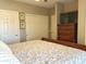Bedroom with a decorative bedframe, television and ample storage space at 6535 E Superstition Springs Blvd # 217, Mesa, AZ 85206