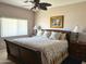 Main bedroom suite featuring a ceiling fan and plenty of natural light at 6535 E Superstition Springs Blvd # 217, Mesa, AZ 85206