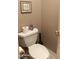 Toilet room features toilet with paper and air freshener on top at 6535 E Superstition Springs Blvd # 217, Mesa, AZ 85206