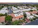 Aerial view of a residential neighborhood featuring homes with red tile roofs and well-maintained landscaping at 6701 N Scottsdale Rd # 26, Scottsdale, AZ 85250