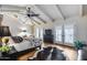Airy bedroom with a vaulted ceiling, ceiling fan, and French doors for great natural light at 6701 N Scottsdale Rd # 26, Scottsdale, AZ 85250
