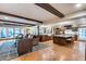 Expansive open-concept living area featuring exposed beams and seamless flow to the kitchen at 6701 N Scottsdale Rd # 26, Scottsdale, AZ 85250