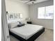 Bright bedroom featuring a queen-size bed, neutral decor, and ample natural light at 694 W Park Ave, Chandler, AZ 85225
