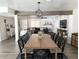 Bright dining area with an open floor plan, stylish decor, and modern finishes throughout the home at 694 W Park Ave, Chandler, AZ 85225