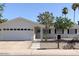 Charming single-story home with a well-manicured yard, a two-car garage, and inviting curb appeal at 694 W Park Ave, Chandler, AZ 85225