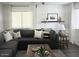 Comfortable living room with cozy furniture, layered textures, and abundant natural light at 694 W Park Ave, Chandler, AZ 85225