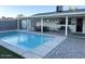 Refreshing pool surrounded by a patio, perfect for outdoor enjoyment at 694 W Park Ave, Chandler, AZ 85225