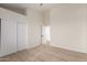 Spacious bedroom with a closet and carpet flooring at 7179 W Surrey Ave, Peoria, AZ 85381