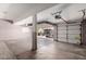 Bright garage with two-car door and exterior view at 7179 W Surrey Ave, Peoria, AZ 85381