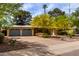Beautiful home with well-maintained landscaping, complemented by a spacious driveway and attached two-car garage at 7202 N 16Th Dr, Phoenix, AZ 85021