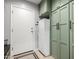 This mud room features extra storage and quick access to both interior and exterior spaces at 7202 N 16Th Dr, Phoenix, AZ 85021