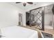 Bedroom with large glass sliding doors and access to the living room at 7210 N 17Th Ave, Phoenix, AZ 85021