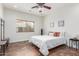 Comfortable bedroom with ceiling fan and a window to let in natural light at 7210 N 17Th Ave, Phoenix, AZ 85021
