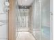 Walk-in closet featuring built-in mirrors, lighting, and shelving for ample storage at 7210 N 17Th Ave, Phoenix, AZ 85021