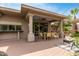 Covered patio features outdoor dining area and brick paving stones at 7210 N 17Th Ave, Phoenix, AZ 85021