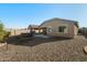 Large backyard with a hot tub and patio at 7577 S Towel Creek Dr, Gold Canyon, AZ 85118
