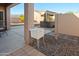 Beautiful backyard view with a sink, hot tub, and desert landscaping at 7577 S Towel Creek Dr, Gold Canyon, AZ 85118