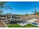 Inviting community area offers seating, picnic tables, and a cornhole game area for outdoor fun and recreation at 7577 S Towel Creek Dr, Gold Canyon, AZ 85118