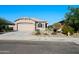 Attractive single-story home with a two-car garage and low-maintenance yard at 7577 S Towel Creek Dr, Gold Canyon, AZ 85118