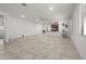 Spacious living room featuring tile flooring and an open view into the kitchen at 7577 S Towel Creek Dr, Gold Canyon, AZ 85118