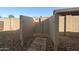 Outdoor shower area with a stone pathway and backyard privacy screen at 7577 S Towel Creek Dr, Gold Canyon, AZ 85118