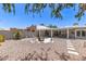 Expansive backyard featuring desert landscaping, patio, and inviting seating area at 7736 E Rancho Vista Dr, Scottsdale, AZ 85251
