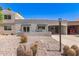 Charming single-story home with desert landscaping and a covered parking area at 7736 E Rancho Vista Dr, Scottsdale, AZ 85251