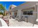 Inviting front porch with outdoor seating, offering a comfortable and stylish space at 7736 E Rancho Vista Dr, Scottsdale, AZ 85251