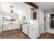 Well-lit kitchen featuring white cabinets, stainless steel appliances, and stylish countertops at 7736 E Rancho Vista Dr, Scottsdale, AZ 85251