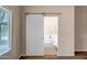 View of a bathroom through an open sliding door at 8178 W Tonopah Dr, Peoria, AZ 85382