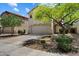 Charming two-story home with a well-maintained front yard and a spacious driveway at 8259 W Carol Ave, Peoria, AZ 85345