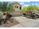 Charming two-story home with a well-maintained front yard and a spacious driveway at 8259 W Carol Ave, Peoria, AZ 85345
