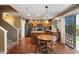 Charming kitchen with an island and breakfast table, complete with stainless steel appliances at 8259 W Carol Ave, Peoria, AZ 85345