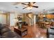 Spacious living room with hardwood floors and staircase leading to the second story at 8259 W Carol Ave, Peoria, AZ 85345