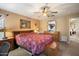 Relaxing bedroom with a ceiling fan and ample natural light at 8259 W Carol Ave, Peoria, AZ 85345