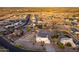 Desert home with expansive fenced yard, outbuildings, surrounded by desert landscaping in an established neighborhood at 8351 S Summit Dr, Casa Grande, AZ 85193