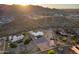 Expansive aerial view of a desert home featuring spacious grounds and mountain views at 8351 S Summit Dr, Casa Grande, AZ 85193