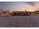 Spacious backyard with multiple storage sheds and play equipment at 8351 S Summit Dr, Casa Grande, AZ 85193
