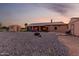 Large backyard with storage sheds, play area, and ample space at 8351 S Summit Dr, Casa Grande, AZ 85193