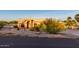 Inviting single-story home featuring a well-manicured front yard and neutral-toned exterior at 8351 S Summit Dr, Casa Grande, AZ 85193