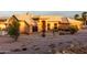 Attractive single-story home showcasing desert landscaping, a welcoming entrance, and a tile roof at 8351 S Summit Dr, Casa Grande, AZ 85193